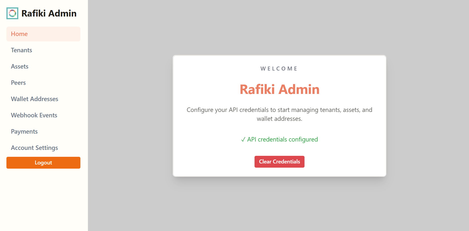 A screenshot of the Rafiki Admin application user interface displaying the home page with API credentials configured. It shows the full left-hand navigation menu including Home, Tenants, Assets, Peers, Wallet Addresses, Webhook Events, Payments, and Account Settings.